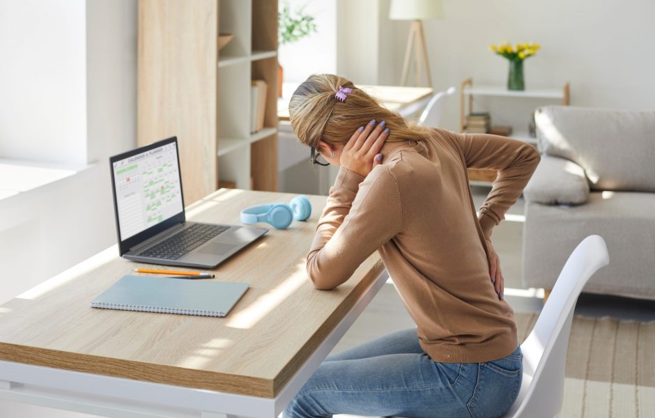 Tired,Woman,Who,Works,On,Computer,At,Desk,In,Sedentary